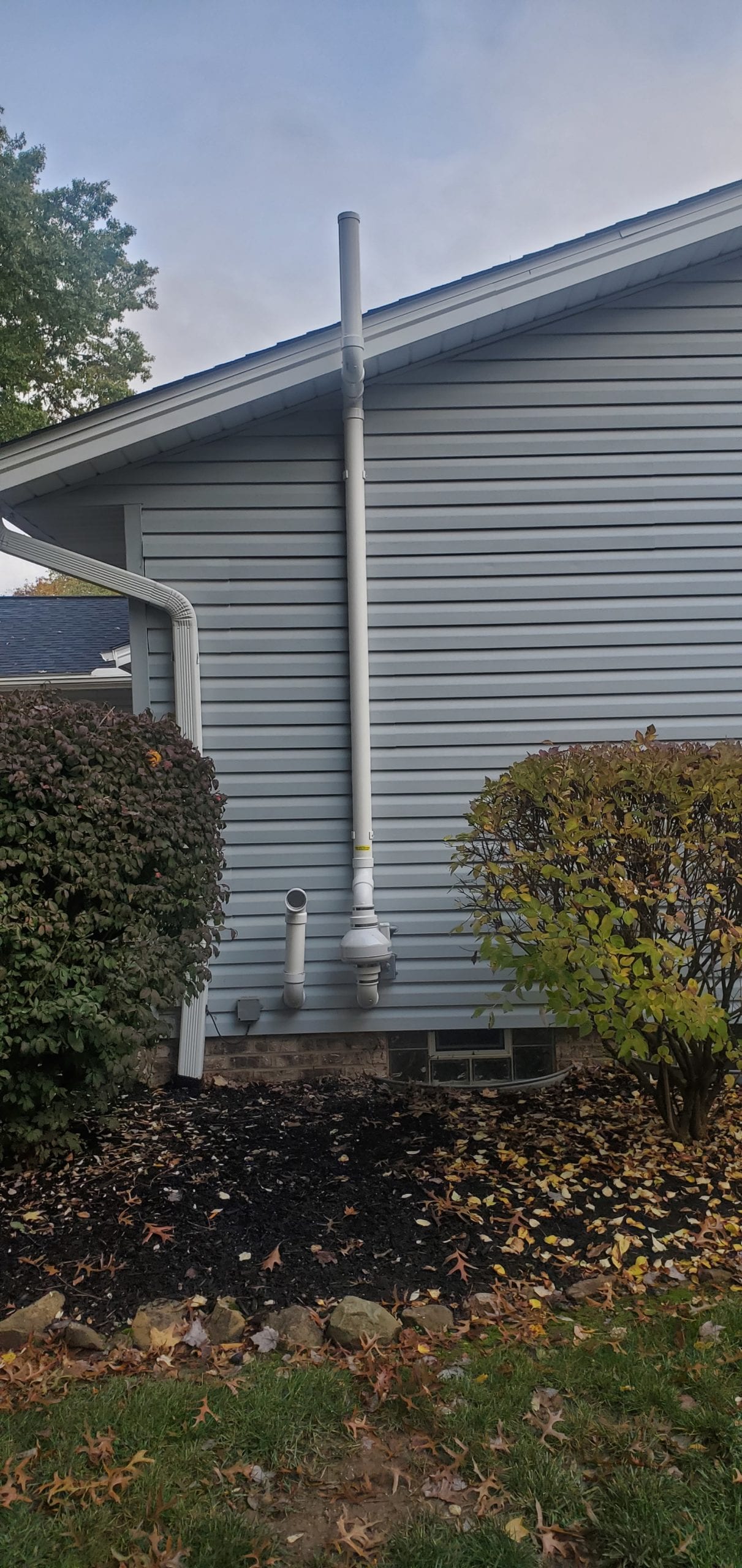 Exterior Radon mitigation System on outside of house